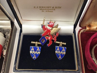 Lot 59 - Pair of silver and enamel sheild crest cufflinks and similar style rampant lion brooch, two silver shooting related crest pendants, two Radley wristwatches etc