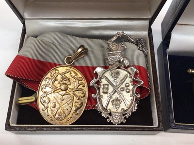 Lot 59 - Pair of silver and enamel sheild crest cufflinks and similar style rampant lion brooch, two silver shooting related crest pendants, two Radley wristwatches etc