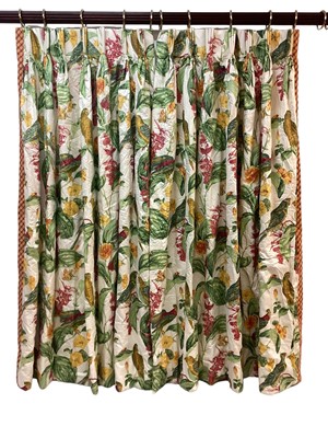 Lot 1428 - One pair of Pierre Frey curtains parrot and jungle pattern cotton fabric with orange and red check edging. Pinch pleat headings, lined and interlined. Top width 80cm, full fabric width 195cm, dr...