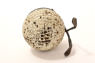Lot 298 - Late Victorian novelty silver vesta holder and striker in the form a golf ball with silver mounts