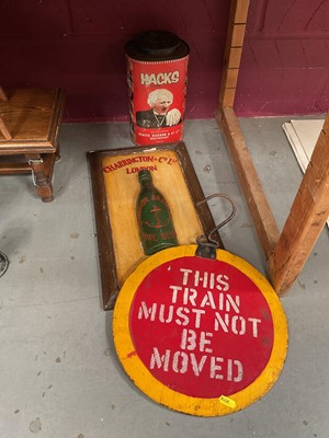 Lot 729 - Old painted train sign, a pub sign, and a vintage tin (3)