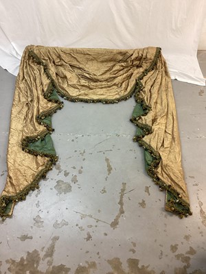 Lot 1431 - Three pairs of golden brown Pierre Frey curtains with decorative trimming down the side and matching swag and drape pelmets. Gathered top width 100cm, full fabric width 186cm, drop length 321cm....