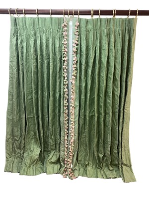 Lot 1432 - Three pairs of green brocade curtains with pinch pleats at the top and pink and green tasselled fringe down one side of each curtain. Top width 83cm, full fabric width 196cm, drop length 211cm....