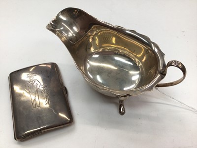 Lot 1044 - Edwardian silver cigarette case with engraved father and son "Senior, Junior", together with a 1960s silver sauce boat