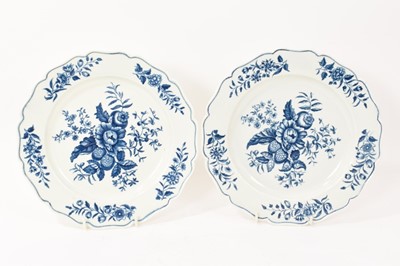 Lot 143 - Pair of Worcester porcelain plates, circa 1785, printed in blue with the Pinecone pattern, scalloped edges, crescent marks, 24.5cm diameter