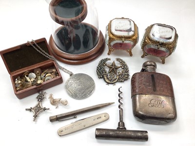 Lot 1049 - Victorian silver mounted glass hip flask with crocodile leather covering, silver penknife, silver pencil, studs and cufflinks, other bijouterie and a wooden watch stand with plastic dome