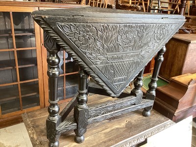 Lot 1358 - Late Victorian carved triangular table with single drop leaf