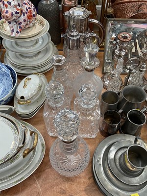 Lot 542 - Three silver mounted cut glass decanters, pair of cut glass decanters, a claret jug with plated mounts and a lemonade jug with plated mounts.