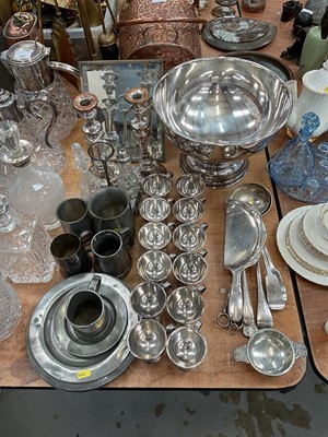 Lot 543 - Group of antique pewter items, silver plated punch bowl and cups, candlesticks and other plated wares.