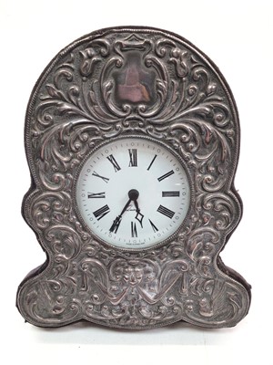 Lot 1078 - Silver mounted desk clock with embossed scroll decoration