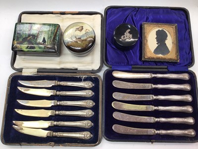 Lot 1084 - Set of six silver handled butter knives in fitted case, another plated set, three lacquered trinket boxes and a Victorian silhoutte portrait