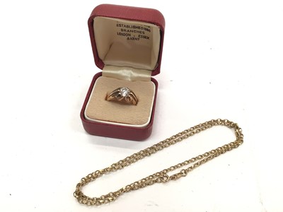 Lot 1089 - 9ct gold ring with a synthetic white stone and a yellow metal chain