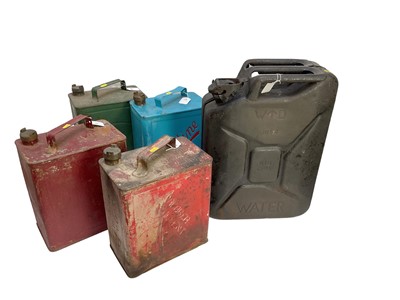 Lot 91 - Redline can, Esso can and two others together with a a 1954 war department water can. (5)