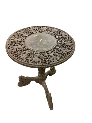 Lot 1400 - 19th century Anglo-Indian pierced and carved table with circular top depicting figures, 67cm diameter, 75cm high