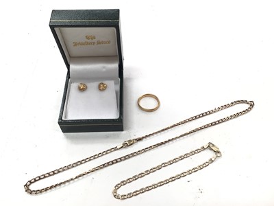 Lot 1110 - 22ct gold wedding ring, two 9ct gold chains and pair of yellow metal stud earrings