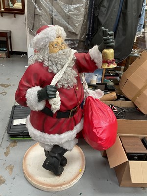 Lot 373 - Large free standing Father Christmas figure with sack, possibly resin, 123cm in overall height.