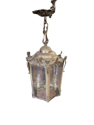 Lot 1361 - Set of three brass and bevelled glass hexagonal hall lanterns