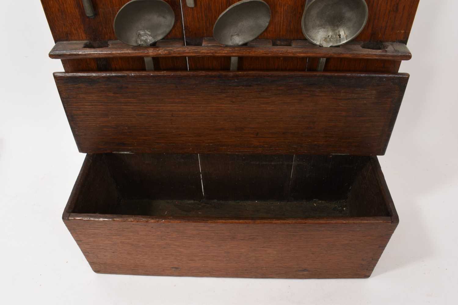 Lot 798 - 19th century spoon rack with pewter spoons
