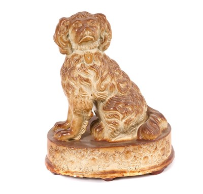 Lot 149 - 19th century salt glazed spaniel figure