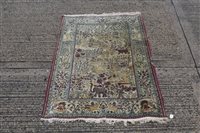 Lot 1551 - Kashan-style silk rug, cream ground with...
