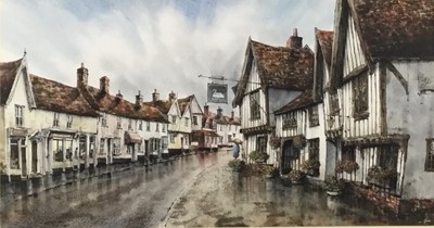 Lot 32 - Reg Siger, watercolour of Lavenham High Street, 30cm x 56cm, signed, in glazed frame