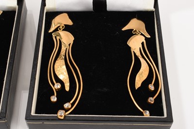 Lot 500 - Two pairs of contemporary hand made 18ct gold and gem-set pendant earrings by Diana Olivia Maynard