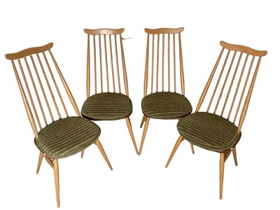 Lot 1214 - Set of four light Ercol stick back dining chairs (4)