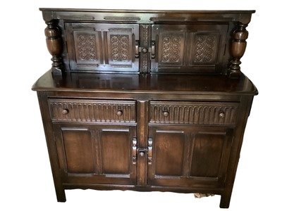 Lot 1232 - Ericol dark wood Court Cabinet with two drawers, double base cupboard and double cupboard above, 1.3m wide