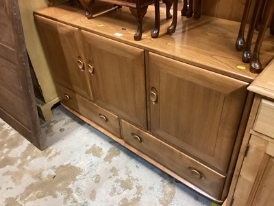 Lot 1228 - Light oak sideboard with triple door cupboard & two drawers, on castors