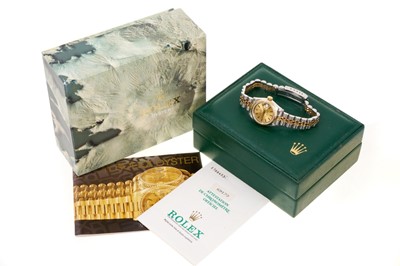 Lot 580 - Ladies Rolex Oyster Perpetual DateJust gold and stainless steel wristwatch, boxed with papers