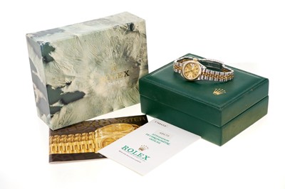 Lot 580 - Ladies Rolex Oyster Perpetual DateJust gold and stainless steel wristwatch, boxed with papers