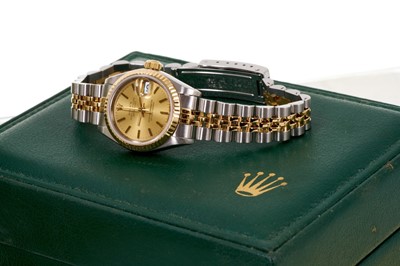 Lot 580 - Ladies Rolex Oyster Perpetual DateJust gold and stainless steel wristwatch, boxed with papers