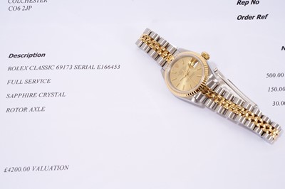 Lot 580 - Ladies Rolex Oyster Perpetual DateJust gold and stainless steel wristwatch, boxed with papers