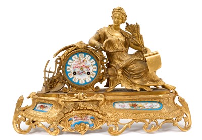 Lot 656 - 19th century French gilt metal and porcelain mantel clock, in glass case