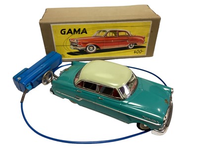 Lot 1854 - Gama made in Western Germany, remote controlled Kapitan tinplate vehicle in original box. plus an unboxed Triang minic garages recovery truck (2)