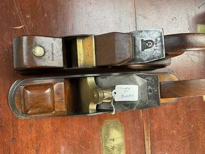 Lot 2427 - Victorian mahogany, steel and brass plane by Ward & Payne , 29.5cm in length, 6cm in width, together with another Victorian plane, with blade by Sorby, 36.5cm x 7.4cm (2).