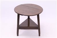 Lot 1600 - George III oak cricket table, the circular top...