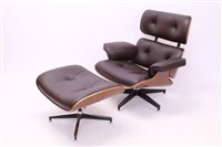 Lot 1603 - Reproduction Eames-style lounge chair and...