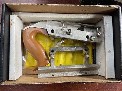 Lot 2481 - Stanley combination plane in original box, another, Stanley spoke shave and other Stanley planes and hand tools (8).
