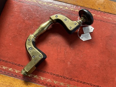 Lot 2403 - Rare Victorian brass mounted ebony brace by Atkinson Brothers, with unusual hollow brass handle, as opposed to an ebony handle. It is believed to be an almost unique feature of this brace, with...