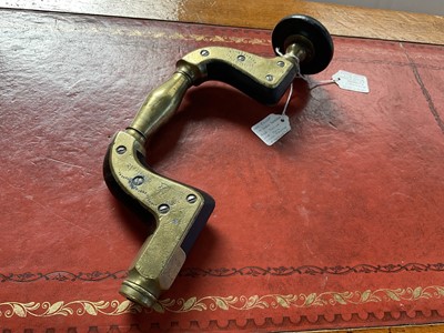Lot 2403 - Rare Victorian brass mounted ebony brace by Atkinson Brothers, with unusual hollow brass handle, as opposed to an ebony handle. It is believed to be an almost unique feature of this brace, with...