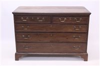 Lot 1611 - George III oak chest of drawers with moulded...