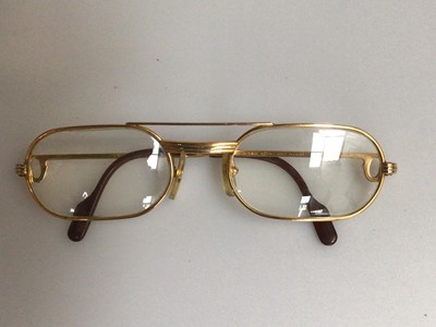 Lot 2148 - Pair of Cartier gilt metal reading glasses