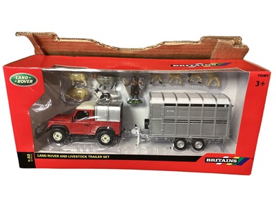 Lot 1921 - Britains diecast 1:32 Scale Land Rover & Livestock Trailer, in window box 43138A1, Atlas and other Tractors, Tim Tractor with Front Mower & Accessories 33004 and Tractor with Baler &...