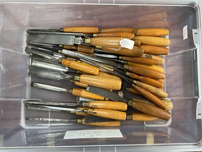 Lot 2493 - Collection of approximately 35 vintage chisels with steel blades and wooden handles, by Marples, Sorby etc