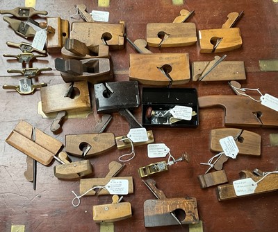 Lot 2502 - Collection of miniature planes to include antique miniature boxwood router, miniature brass smoother, rebate planes and other miniature and small planes and spoke shaves (27)