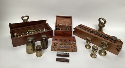 Lot 2588 - Collection of mostly antique brass weights, including cased sets, a set of Avery weights, etc