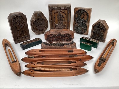 Lot 2608 - Collection of antique wood and metal printing blocks and a group of weaving shuttles