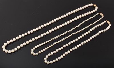 Lot 508 - Three cultured pearl necklaces with gold clasps