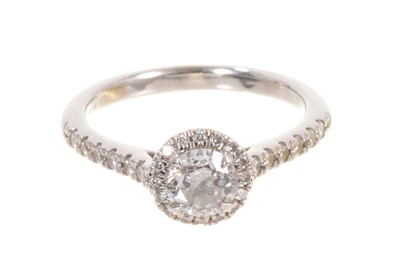 Lot 489 - Diamond and platinum halo cluster ring